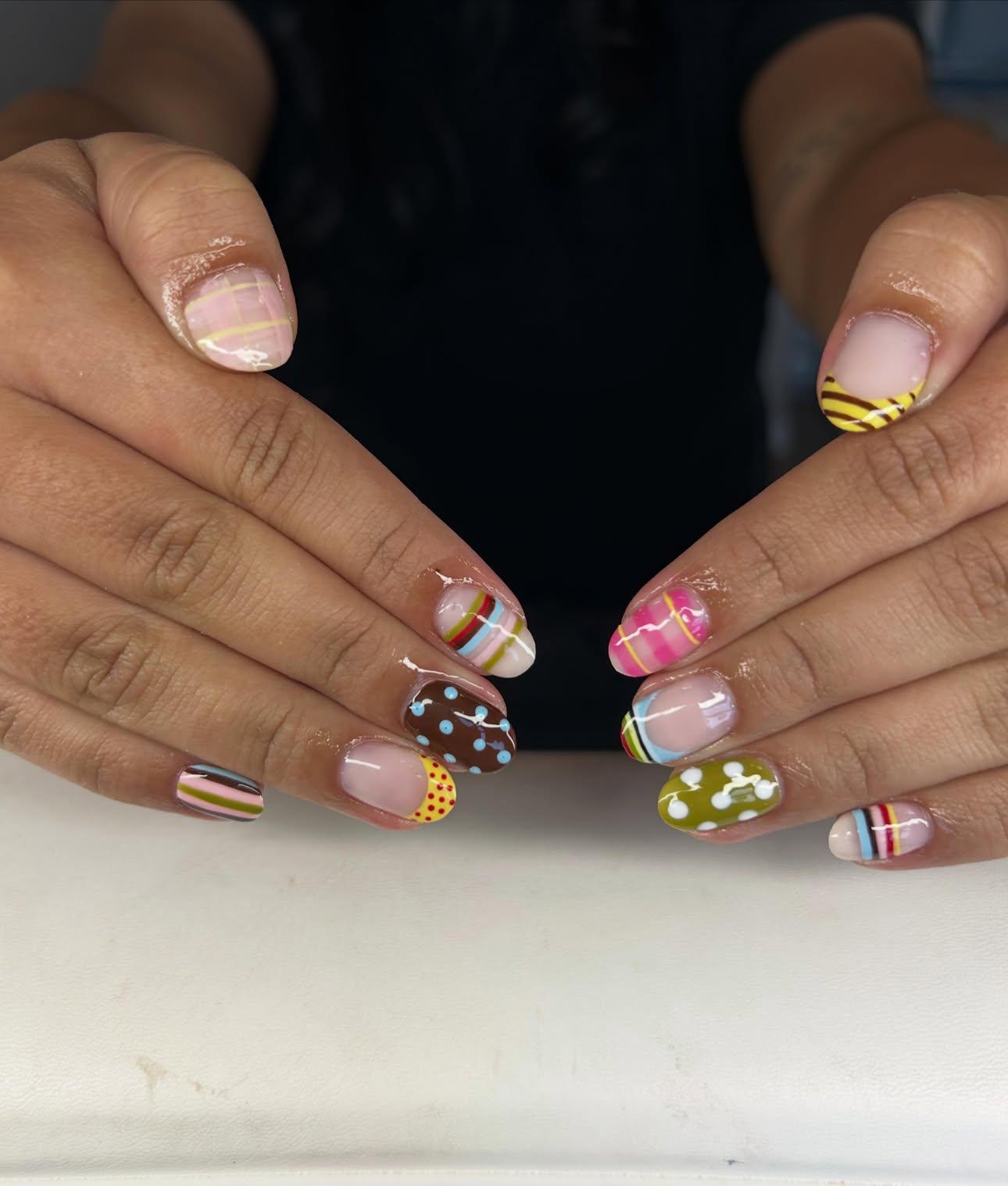Mix-and-match nails with plaid, stripes, and polka dots