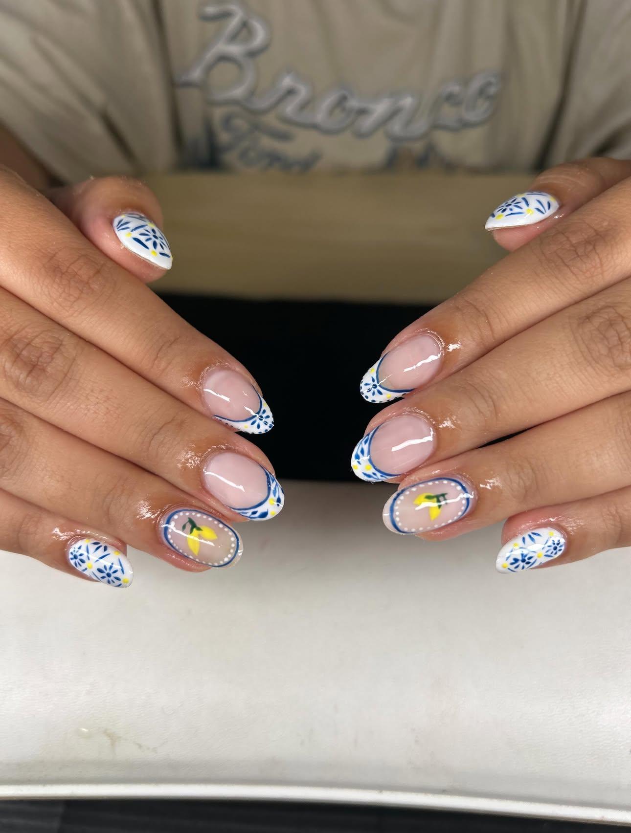 Mediterranean tile nails with navy, yellow, and hand-painted lemons